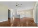 Bright and spacious living room with hardwood floors and kitchen at 1519 Atares Dr # 112, Punta Gorda, FL 33950