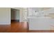 Spacious living room with wood floors and access to a patio at 1519 Atares Dr # 112, Punta Gorda, FL 33950