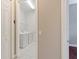 Bright laundry room with washer, dryer, and shelving at 1519 Atares Dr # 112, Punta Gorda, FL 33950