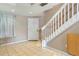 Inviting entryway with tiled floors and staircase at 1186 Rio De Janeiro Ave # 104, Punta Gorda, FL 33983