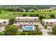 Aerial view of condo community with pool and parking at 1186 Rio De Janeiro Ave # 104, Punta Gorda, FL 33983