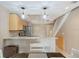 Modern kitchen with granite countertops and stainless steel appliances at 1186 Rio De Janeiro Ave # 104, Punta Gorda, FL 33983