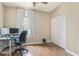Home office with wood flooring and built-in closet at 1186 Rio De Janeiro Ave # 104, Punta Gorda, FL 33983