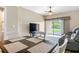 Casual dining area with a view of living room and access to a patio at 1186 Rio De Janeiro Ave # 104, Punta Gorda, FL 33983