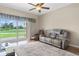 Relaxing living room with sliding glass doors to a patio and a view at 1186 Rio De Janeiro Ave # 104, Punta Gorda, FL 33983