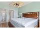 Main bedroom with ensuite bathroom and golf course views at 1186 Rio De Janeiro Ave # 104, Punta Gorda, FL 33983