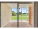 Private screened patio overlooking a lush green golf course at 1186 Rio De Janeiro Ave # 104, Punta Gorda, FL 33983