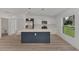 Modern kitchen with stainless steel appliances and white cabinets at 3847 E Price Blvd, North Port, FL 34288