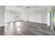 Spacious living area featuring recessed lighting, sleek floors, and sliding glass doors at 16077 Coruna Ct, Punta Gorda, FL 33955