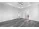 Spacious main bedroom features trey ceilings and gray wood-look floors at 16077 Coruna Ct, Punta Gorda, FL 33955