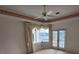 Main bedroom with large windows and access to a patio at 2259 Ryan Blvd, Punta Gorda, FL 33950