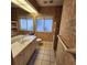 Clean bathroom with a toilet, sink, and shower at 2259 Ryan Blvd, Punta Gorda, FL 33950