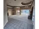 Open living room with high ceilings and views to the pool and patio area at 2259 Ryan Blvd, Punta Gorda, FL 33950