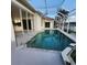 Relaxing pool and spa with screened enclosure at 2259 Ryan Blvd, Punta Gorda, FL 33950