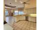 Open kitchen with breakfast bar and view of living area at 2259 Ryan Blvd, Punta Gorda, FL 33950