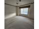 Bright bedroom featuring carpet flooring and a ceiling fan at 2259 Ryan Blvd, Punta Gorda, FL 33950