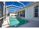 Inviting screened pool area with spacious deck at 2259 Ryan Blvd, Punta Gorda, FL 33950