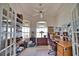 Home office with built-in shelving and hardwood desk at 2259 Ryan Blvd, Punta Gorda, FL 33950