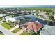 Aerial view of waterfront property with houses and boats at 2259 Ryan Blvd, Punta Gorda, FL 33950