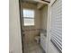 Small bathroom with single sink vanity, toilet and shower at 2259 Ryan Blvd, Punta Gorda, FL 33950