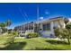 Exterior view of house with lush landscaping at 2259 Ryan Blvd, Punta Gorda, FL 33950