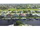 Community view, waterfront homes with boats at 2259 Ryan Blvd, Punta Gorda, FL 33950