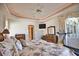 Main bedroom with a treadmill and large windows at 2259 Ryan Blvd, Punta Gorda, FL 33950