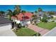 Single-Gathering home with red tile roof and driveway at 2259 Ryan Blvd, Punta Gorda, FL 33950