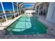 Screened in pool area with spa and canal view at 2259 Ryan Blvd, Punta Gorda, FL 33950