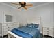 Upstairs bedroom with a queen bed and hardwood floors at 17258 Acapulco Rd # 122, Punta Gorda, FL 33955