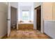 Bathroom with a soaking tub, shower, and tile flooring at 1516 Natrona Dr, North Port, FL 34286