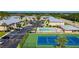 Community features a tennis court, pool, and ample parking at 25050 Sandhill Blvd # A4 Bldg 2, Punta Gorda, FL 33983