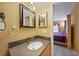 Bathroom with vanity and a view of a bedroom at 25050 Sandhill Blvd # A4 Bldg 2, Punta Gorda, FL 33983