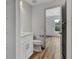 Clean bathroom with white vanity, toilet and shower at 4637 Corbett Ln, North Port, FL 34288