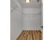Walk-in closet with wire shelving and wood flooring at 4637 Corbett Ln, North Port, FL 34288