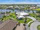 Luxury waterfront home with circular driveway and lush landscaping at 374 Severin Se Rd, Port Charlotte, FL 33952