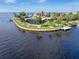 Luxury waterfront home with private dock and beautiful landscaping at 374 Severin Se Rd, Port Charlotte, FL 33952
