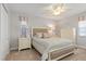 Guest bedroom with a queen bed and neutral decor at 374 Severin Se Rd, Port Charlotte, FL 33952