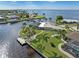 Beautiful waterfront home with private dock and tropical landscaping at 374 Severin Se Rd, Port Charlotte, FL 33952