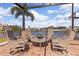 Enjoy waterfront views from comfy chairs around a table at 374 Severin Se Rd, Port Charlotte, FL 33952