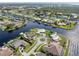 Expansive waterfront property showcasing multiple homes and canals at 374 Severin Se Rd, Port Charlotte, FL 33952