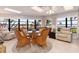 Sunroom with water views and comfortable seating at 374 Severin Se Rd, Port Charlotte, FL 33952