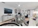 Bright living room with comfy seating, large TV, and stylish decor at 374 Severin Se Rd, Port Charlotte, FL 33952