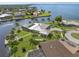 Luxury waterfront home with private dock and lush landscaping at 374 Severin Se Rd, Port Charlotte, FL 33952