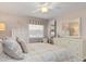 Calm bedroom with a queen bed and neutral decor at 374 Severin Se Rd, Port Charlotte, FL 33952