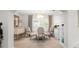 Elegant dining room with a round glass table and four chairs at 374 Severin Se Rd, Port Charlotte, FL 33952