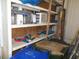 Storage room with shelving and various items at 5505 Holiday Park Blvd, North Port, FL 34287