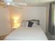Bedroom with a queen-size bed and ceiling fan at 5505 Holiday Park Blvd, North Port, FL 34287