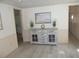 Entryway with a rustic-style storage cabinet at 5505 Holiday Park Blvd, North Port, FL 34287