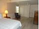 Bedroom with a rocking chair and double bed at 5505 Holiday Park Blvd, North Port, FL 34287